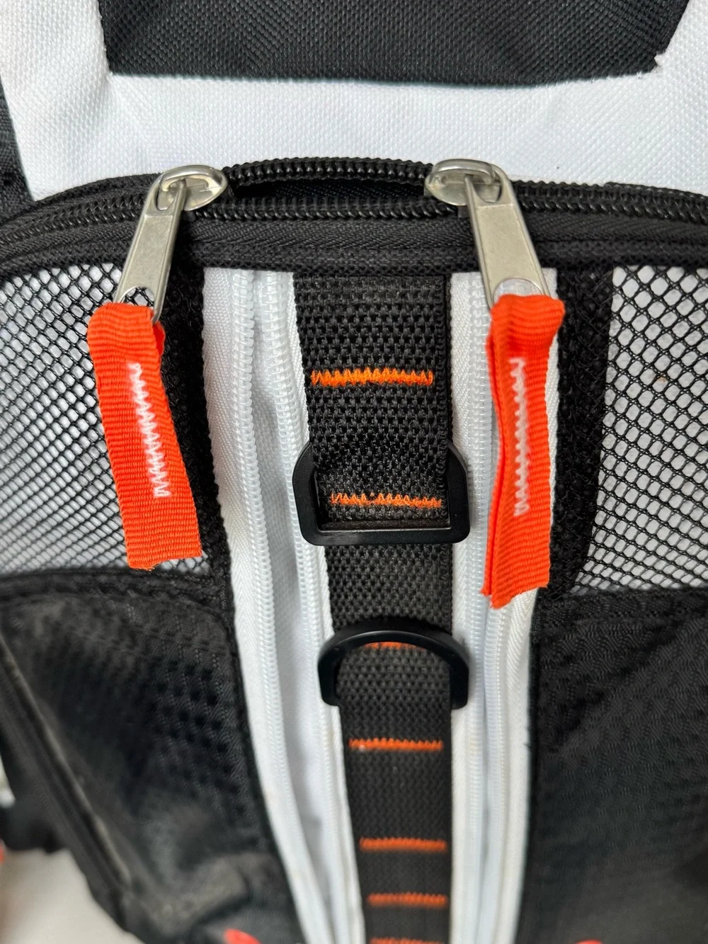 Black & White Backpack with Orange Accents
